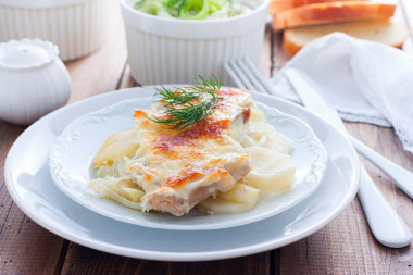 French pork with potatoes and cheese in the oven