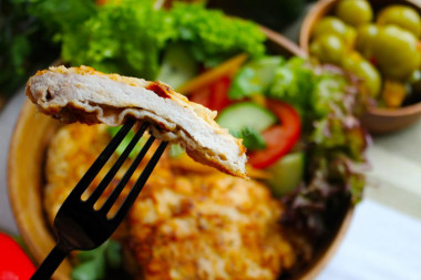 Juicy pork chops in a frying pan, tender and soft