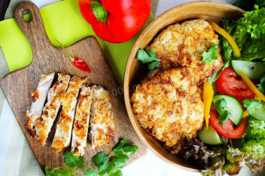 Juicy pork chops in a frying pan, tender and soft