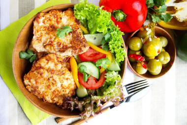 Juicy pork chops in a frying pan, tender and soft