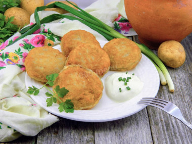 Potato pancakes with minced meat in a frying pan