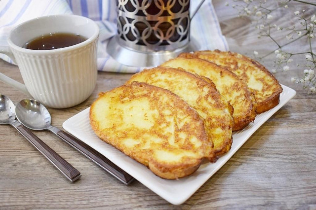 Toast with egg in a pan