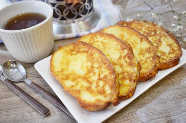 Toast with egg in a pan