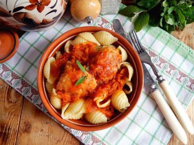 Meatballs in tomato sauce in a frying pan