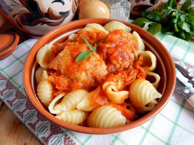 Meatballs in tomato sauce in a frying pan