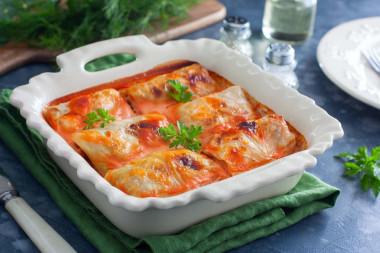 Cabbage rolls with cabbage and minced meat in the oven