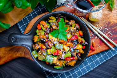 Vegetables in soy sauce in a frying pan