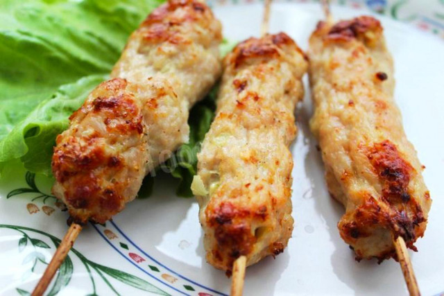 Lula kebab on pork skewers in the oven