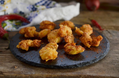 Shrimp in batter in a frying pan