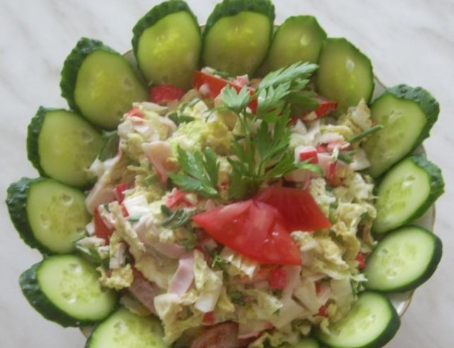 Salad with tomatoes, green onions and crab sticks