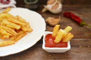 French fries in a frying pan at home