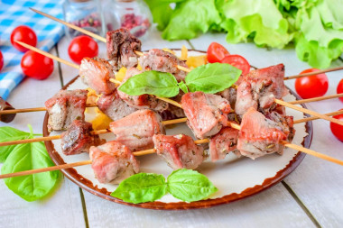 Barbecue on a baking sheet in the oven made of pork