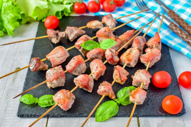 Barbecue on a baking sheet in the oven made of pork