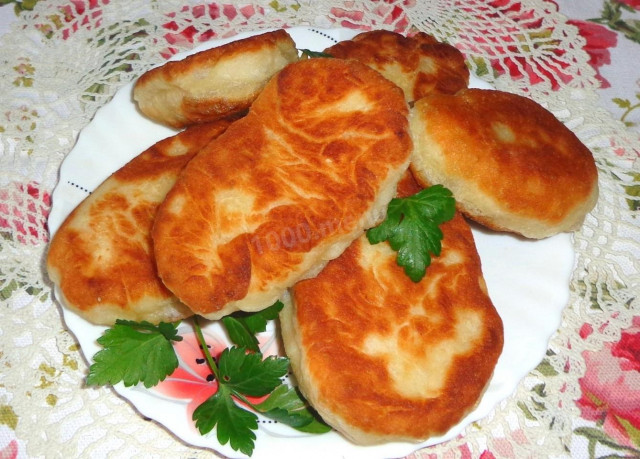 Pies in a frying pan on water