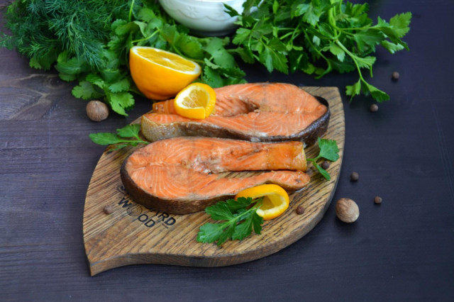 Salmon steak in a frying pan