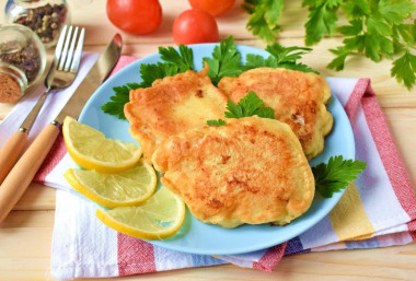 Cod fillet in batter in a frying pan