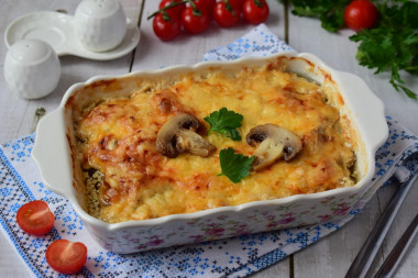 Mushrooms in the oven with cheese and chicken