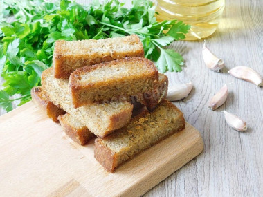 Bread croutons in the oven with garlic